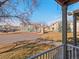 View of the community buildings and landscaping from the covered porch of the unit at 5335 Pecos Way # 4, Denver, CO 80221