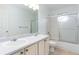 Bright bathroom with dual sinks, generous counter space, and a separate shower and bathtub area at 13176 Alcott Pl, Broomfield, CO 80020