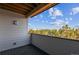 Balcony with a view of mature trees and city skyline at 487 Interlocken Blvd # 408, Broomfield, CO 80021