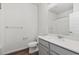 Bathroom featuring a modern vanity, toilet, and shower with glass doors at 487 Interlocken Blvd # 408, Broomfield, CO 80021