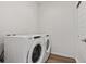 Convenient laundry area with a side by side washer and dryer set at 487 Interlocken Blvd # 408, Broomfield, CO 80021