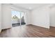 Bright living room featuring a sliding glass door to a balcony at 487 Interlocken Blvd # 408, Broomfield, CO 80021