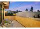 Cozy balcony featuring neutral chairs and tables with a view of the neighborhood at 566 Monroe St, Denver, CO 80206