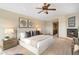 Spacious bedroom featuring a ceiling fan and a cozy ambiance at 566 Monroe St, Denver, CO 80206