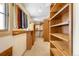 Large walk-in closet with abundant storage, custom shelving, and natural light at 566 Monroe St, Denver, CO 80206