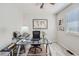 Well-lit office with modern desk, office chair, and plenty of room for productivity at 1382 Braewood Ave, Highlands Ranch, CO 80129