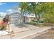 View of the home's side and driveway, showcasing its ranch style at 13765 W 6 Pl, Golden, CO 80401