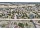 Sprawling aerial view shows the neighborhood layout, including this home and barn at 3562 Pine Meadow Ave, Parker, CO 80138