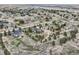 Wide angle aerial view of neighborhood homes surrounded by trees at 3562 Pine Meadow Ave, Parker, CO 80138