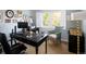 Office space with large window and executive desk and chair at 10886 E Berry Ave, Englewood, CO 80111