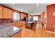 Well-equipped kitchen with stainless steel appliances, a central island, and lots of counter space at 13325 W 86Th Dr, Arvada, CO 80005