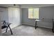 Bright bedroom with ample closet space and a large window at 7495 E Quincy Ave # 205, Denver, CO 80237