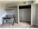 Bedroom featuring closet and desk at 7495 E Quincy Ave # 205, Denver, CO 80237