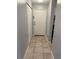 Tiled entryway leading into kitchen at 7495 E Quincy Ave # 205, Denver, CO 80237