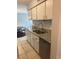 Bright kitchen featuring granite countertops, stainless steel appliances and ample space at 7495 E Quincy Ave # 205, Denver, CO 80237