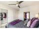 Bedroom featuring a upholstered bed, soft carpet and a double-door closet at 3449 W 63Rd Pl, Denver, CO 80221