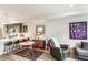 Open concept living area showcasing a modern kitchen, dining space, and cozy seating at 3449 W 63Rd Pl, Denver, CO 80221