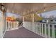 The backyard is overlooked by a relaxing covered back porch with string lights at 12642 E Ohio Ave, Aurora, CO 80012