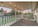 The backyard is overlooked by a relaxing covered back porch with string lights at 12642 E Ohio Ave, Aurora, CO 80012