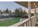 Fenced backyard with a green lawn and mature trees offers privacy and space at 12642 E Ohio Ave, Aurora, CO 80012