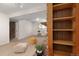 Spacious finished basement area with a fireplace, plush carpeting, and functional layout, ideal for entertainment at 12642 E Ohio Ave, Aurora, CO 80012