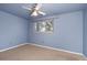 Bright bedroom with a window overlooking the outside scenery at 12642 E Ohio Ave, Aurora, CO 80012