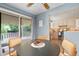 Comfortable dining area with access to the kitchen and a view of the backyard at 12642 E Ohio Ave, Aurora, CO 80012