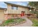 Charming two-story home with red brick and a well-maintained front yard at 12642 E Ohio Ave, Aurora, CO 80012