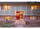 Charming two-story home with red brick and a well-maintained front yard at 12642 E Ohio Ave, Aurora, CO 80012