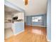 Charming living space with wood floors, access to the kitchen and ample natural light at 12642 E Ohio Ave, Aurora, CO 80012