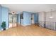 Open floor plan featuring updated floors, easy access to kitchen and outdoor patio at 12642 E Ohio Ave, Aurora, CO 80012