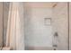 Bathroom shower features a modern shower head and a sleek built-in niche at 9202 W Ontario Dr, Littleton, CO 80128