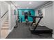 Spacious basement gym featuring modern equipment and plenty of natural light at 14712 Kalamath Ct, Westminster, CO 80023