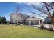 Charming two-story home with a well-manicured lawn and mature trees at 14712 Kalamath Ct, Westminster, CO 80023