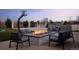 Outdoor area features a fire pit surrounded by modern seating, and basketball hoops at 14712 Kalamath Ct, Westminster, CO 80023