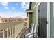 Outdoor patio with gray and white chair, offering relaxing outdoor space at 19437 E Mann Creek Dr # A, Parker, CO 80134