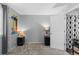 Bedroom featuring neutral walls and carpet, and access to bathroom at 19437 E Mann Creek Dr # A, Parker, CO 80134