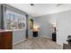 Bedroom offering natural light, neutral carpet, and calming gray walls at 19437 E Mann Creek Dr # A, Parker, CO 80134