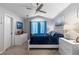Inviting bedroom with vaulted ceiling, large window, and calming decor at 19437 E Mann Creek Dr # A, Parker, CO 80134