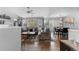 Cozy living room and dining area with ample natural light at 19437 E Mann Creek Dr # A, Parker, CO 80134