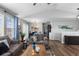 Inviting living room with an open layout, nice decor, and plenty of natural light at 19437 E Mann Creek Dr # A, Parker, CO 80134