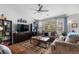 Comfortable living room with stylish furnishings and natural light at 19437 E Mann Creek Dr # A, Parker, CO 80134