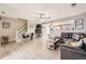 Bright living room featuring wood floors, a ceiling fan and plenty of space at 11009 Gaylord. St, Northglenn, CO 80233