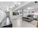 Spacious basement with bright lighting, exposed ceilings, and a comfortable bed setup, and lots of storage at 8955 E 19Th Ave, Aurora, CO 80010