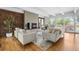 Bright and airy living room with hardwood floors, modern decor, and a fireplace at 8955 E 19Th Ave, Aurora, CO 80010