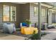 Stylish outdoor patio with comfortable seating, a decorative rug, and modern decor at 8955 E 19Th Ave, Aurora, CO 80010