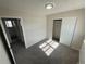 Bedroom with attached closet and doorway at 9065 Cody Ct, Broomfield, CO 80021