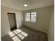 Bedroom with window and closet at 9065 Cody Ct, Broomfield, CO 80021