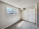 Cozy bedroom features a neutral color palette and a window providing natural light at 9065 Cody Ct, Broomfield, CO 80021