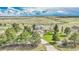Beautiful home surrounded by mature trees and lush landscaping boasts great curb appeal at 2188 Savage Rd, Elizabeth, CO 80107